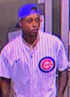 man wearing a baseball cap and shirt